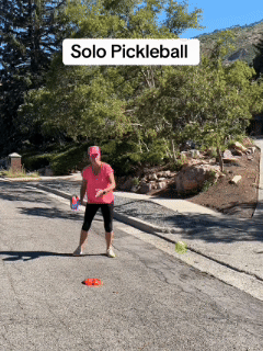 Customer using the PickleCo solo trainer